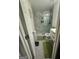 Bathroom featuring a glass enclosed shower with marble tile and hexagon tile flooring at 6409 Caledon Ct, Locust Grove, GA 30248