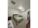 Bedroom with plush carpet, a window, and a ceiling fan for added comfort at 6409 Caledon Ct, Locust Grove, GA 30248