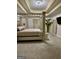 Spacious bedroom with a four-poster bed, neutral decor, and ample natural light at 6409 Caledon Ct, Locust Grove, GA 30248