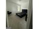 Bright bedroom with carpeted floors and large window, offering a serene retreat at 6409 Caledon Ct, Locust Grove, GA 30248