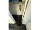 View into a closet with black marble tile at 6409 Caledon Ct, Locust Grove, GA 30248