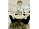 Dining area showcasing a decorative chandelier and modern finishes at 6409 Caledon Ct, Locust Grove, GA 30248