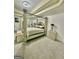 Bright bedroom with a four-poster bed, soft carpet, and stylish decor at 6409 Caledon Ct, Locust Grove, GA 30248