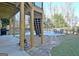 Beautiful backyard featuring a pool, patio area, and lush landscaping at 551 Lees Mill Rd, Fayetteville, GA 30214