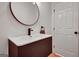 Modern bathroom with a vessel sink, updated vanity, and bronze faucet at 551 Lees Mill Rd, Fayetteville, GA 30214