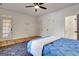 Bedroom with outdoor access, wood-look flooring, and neutral walls for personalized decor at 551 Lees Mill Rd, Fayetteville, GA 30214