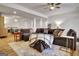 Inviting living room with an oversized sectional sofa, area rug, and an open layout at 551 Lees Mill Rd, Fayetteville, GA 30214