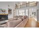 Bright and spacious living room featuring a fireplace and hardwood floors at 551 Lees Mill Rd, Fayetteville, GA 30214