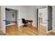 Bright office space with hardwood floors, built-in shelving, and natural light at 551 Lees Mill Rd, Fayetteville, GA 30214