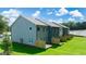 View of the backyard featuring a beautiful row of townhomes at 332 Sinclair Ct # 77, Mcdonough, GA 30253