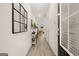 Bright entryway with wood floors, a console table, and neutral paint at 332 Sinclair Ct # 77, Mcdonough, GA 30253