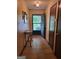 Welcoming foyer with tile flooring, decorative mirror, and coat closet at 259 Independence Dr, Jonesboro, GA 30238