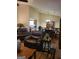 Open-concept living and dining area with hardwood floors and vaulted ceilings at 259 Independence Dr, Jonesboro, GA 30238