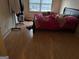 Cozy bedroom with laminate flooring and a large window at 4355 Hambrick Pl, Stone Mountain, GA 30083