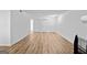 Spacious living room with wood flooring and modern lighting at 843 Seasons Pkwy, Norcross, GA 30093