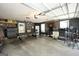 Spacious garage with room for multiple cars, featuring a game area and plenty of storage at 85 Eastwood Frst, Covington, GA 30014