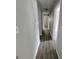 Clean hallway with updated flooring, neutral walls, and access to multiple rooms at 2934 Harris St, East Point, GA 30344