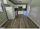 Well-lit kitchen with new appliances, updated cabinetry, and modern flooring at 2934 Harris St, East Point, GA 30344
