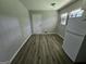 Spacious kitchen with new flooring, white appliances, and ample counter space at 2934 Harris St, East Point, GA 30344
