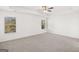 Spacious bedroom featuring soft carpet, large windows, and a ceiling fan at 683 Edgar, Hampton, GA 30228
