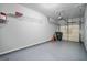 Clean, organized garage with a sealed floor and ample space for storage and parking at 2203 Hyssop Way, Buford, GA 30519