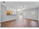 Spacious open-concept living area showcasing hardwood floors and lots of natural light at 2203 Hyssop Way, Buford, GA 30519
