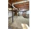 Unfinished basement with painted walls, concrete floors, and exposed ductwork, offering potential for customization at 4688 Brice Dr, Union City, GA 30291