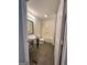 Bathroom featuring a glass bowl sink on black stand and a tub-shower combo at 4688 Brice Dr, Union City, GA 30291