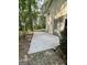 A concrete patio extends from the house, offering an outdoor space with room for seating and relaxation at 4688 Brice Dr, Union City, GA 30291