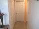 Hallway with multiple storage closets and doorways at 3232 Deer Pause Ln, Decatur, GA 30034