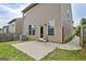 Back of home featuring an outdoor patio and fenced-in yard space at 529 Dasheill Ln, Atlanta, GA 30349