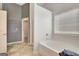 Bright bathroom with a tub, a walk-in shower, and tile floors at 529 Dasheill Ln, Atlanta, GA 30349