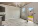 Dining area with a view to the back yard that offers an abundance of natural light from the large window at 529 Dasheill Ln, Atlanta, GA 30349