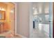 Hallway shot showing a half bathroom to the left and living space ahead at 529 Dasheill Ln, Atlanta, GA 30349