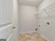 Empty laundry room featuring linoleum floors and wire shelving at 529 Dasheill Ln, Atlanta, GA 30349