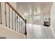 Open-concept living room with a fireplace, large windows, and modern light gray flooring at 529 Dasheill Ln, Atlanta, GA 30349
