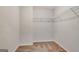 Spacious walk-in closet with carpet, shelving, and white walls at 529 Dasheill Ln, Atlanta, GA 30349