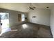 Spacious living room with natural light, showcasing potential and awaiting transformation at 133 Dove Lndg, Social Circle, GA 30025