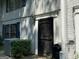 Charming townhouse showcasing a beautifully ornamented front door and well-maintained surroundings at 412 Sycamore Dr # D, Decatur, GA 30030