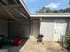 Functional garage area with access to an outdoor patio and storage options at 412 Sycamore Dr # D, Decatur, GA 30030