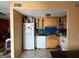 Functional kitchen features essential appliances and ample counter space, ready for renovation at 412 Sycamore Dr # D, Decatur, GA 30030