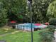 Community pool area surrounded by lush greenery, perfect for relaxation and recreation at 412 Sycamore Dr # D, Decatur, GA 30030