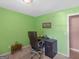 Green office space complete with a desk, comfortable chair, and natural lighting, ideal for productivity at 2866 Rosecommons Dr, Hampton, GA 30228
