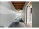 Unfinished basement featuring exposed ceiling and cement walls with an open sliding door at 11 Chad Ct, Mcdonough, GA 30253