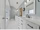 Elegant bathroom with double vanities, marble countertops, and separate tub and shower at 11 Chad Ct, Mcdonough, GA 30253