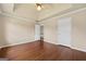 Lovely bedroom featuring hardwood floors and a tray ceiling at 11 Chad Ct, Mcdonough, GA 30253