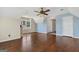 Spacious bonus room features hardwood floors, a ceiling fan, and a large window at 11 Chad Ct, Mcdonough, GA 30253