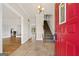 Foyer with a staircase and views into the home's living areas at 11 Chad Ct, Mcdonough, GA 30253