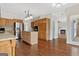 Spacious kitchen with stainless steel appliances, an island, and a view into the living room at 11 Chad Ct, Mcdonough, GA 30253