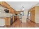 Spacious kitchen with stainless steel appliances, an island, and wooden cabinetry at 11 Chad Ct, Mcdonough, GA 30253